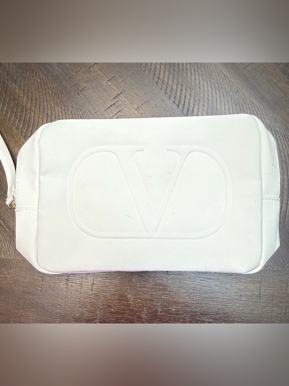 Embossed V Logo Toiletry Bag in White((small tiny stain see pictures